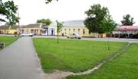 Walking out of the park, the first street is Lenin Street.